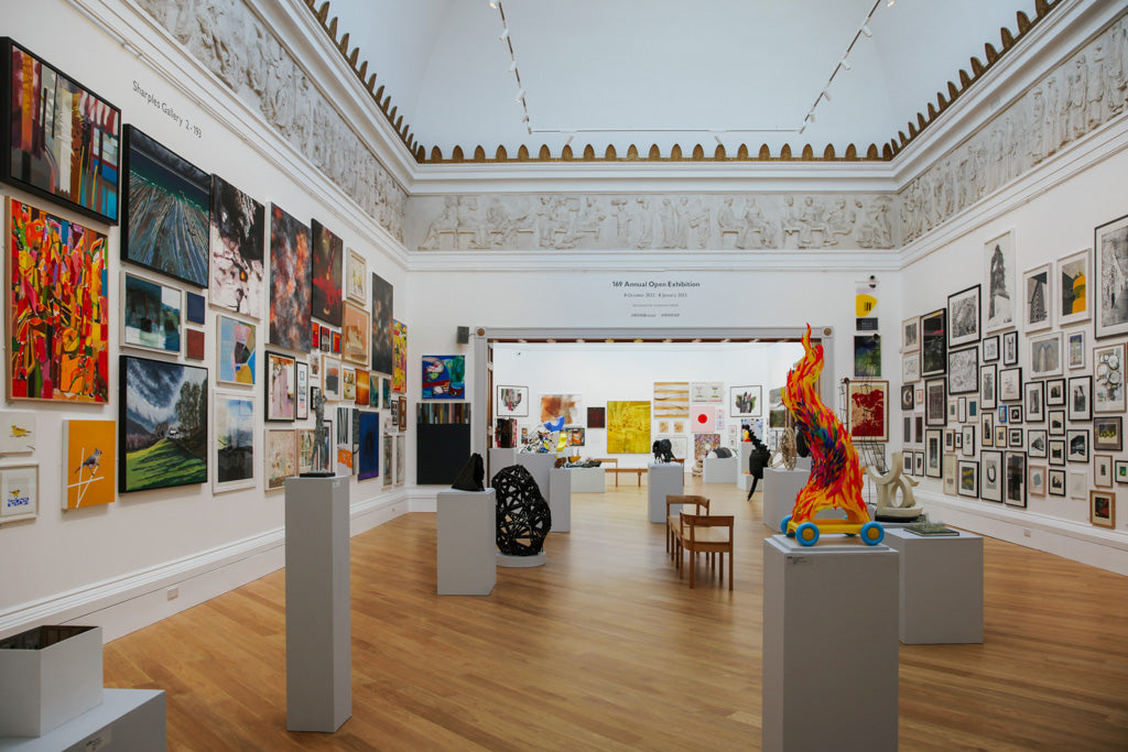 A gallery space at the RWA Bristol, walls and plinths display many artworks in the Annual Open Exhibition